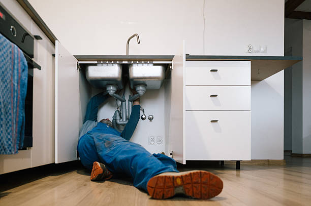 Professional Emergency Plumber technician working in Stacy, MN